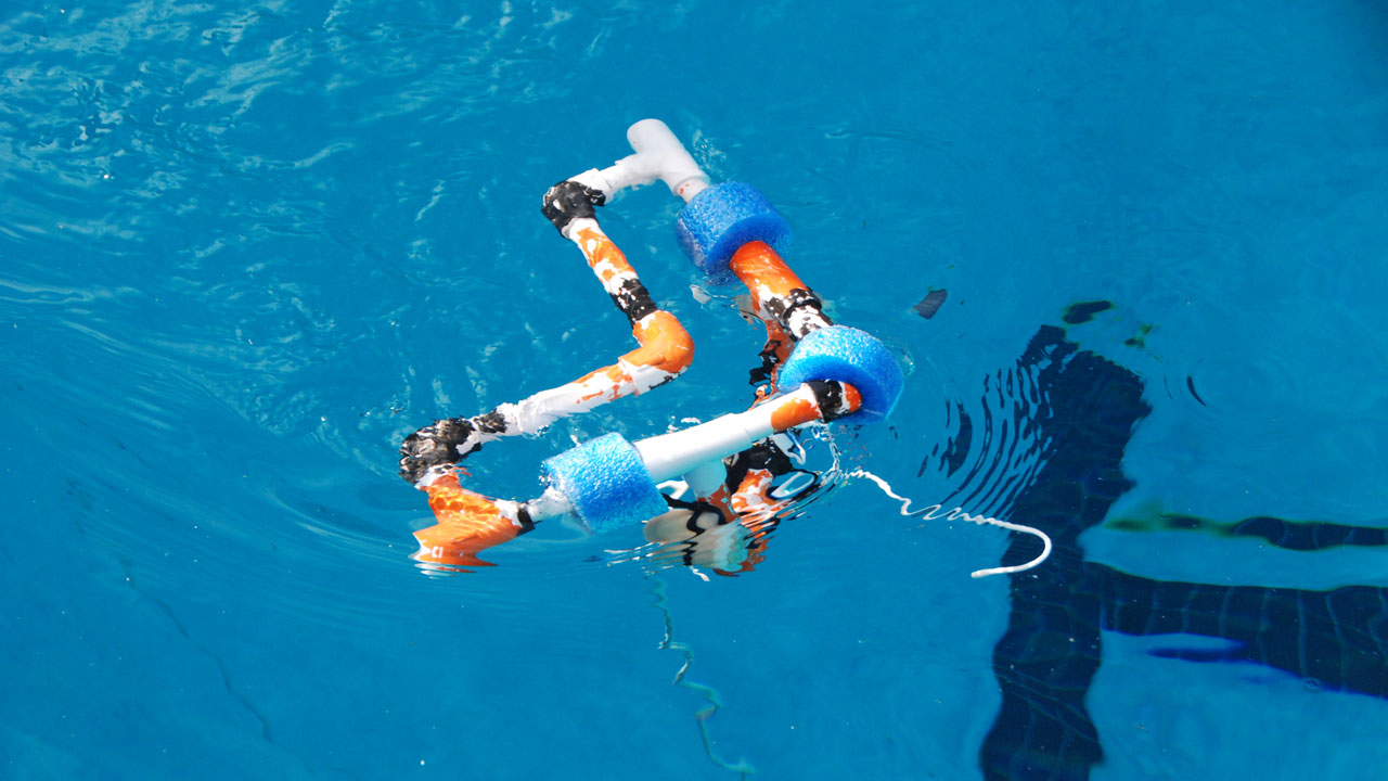 Underwater robot prepares for pool mission.