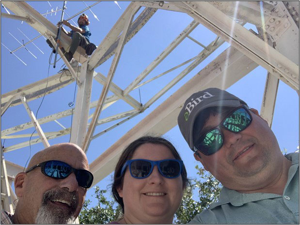 Helping to install the Motus Station from left- Dr. John Dindo (DISL), Emma Rhodes (Ph.D. Candidate), and Dr. Orin Robinson (Cornell University). Overhead is Kyle Sheppard.