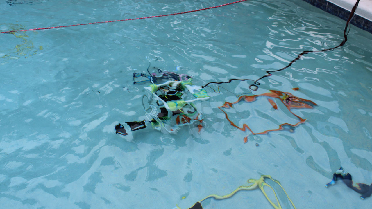 wind ripples water as teams fly rovs