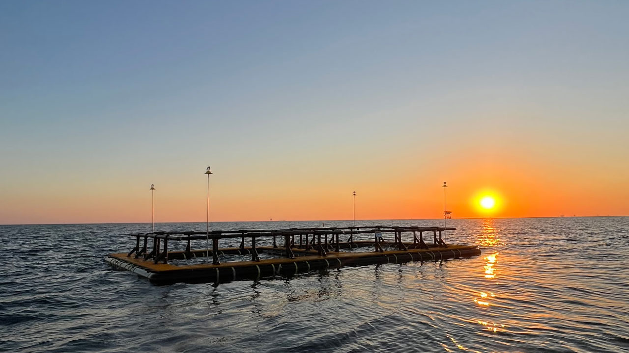 sunset pic of platform on water